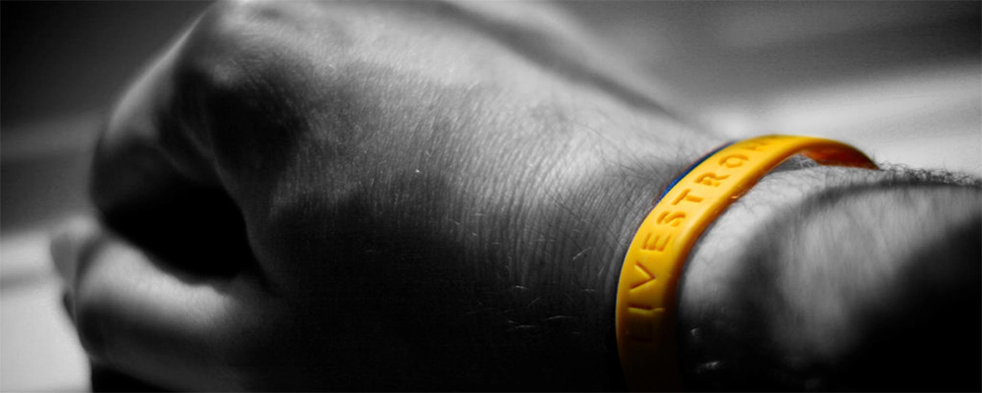 photo of person wearing livestrong bracelet